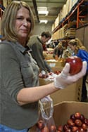 Photo of the legal team volunteering at Gleaners Food Bank